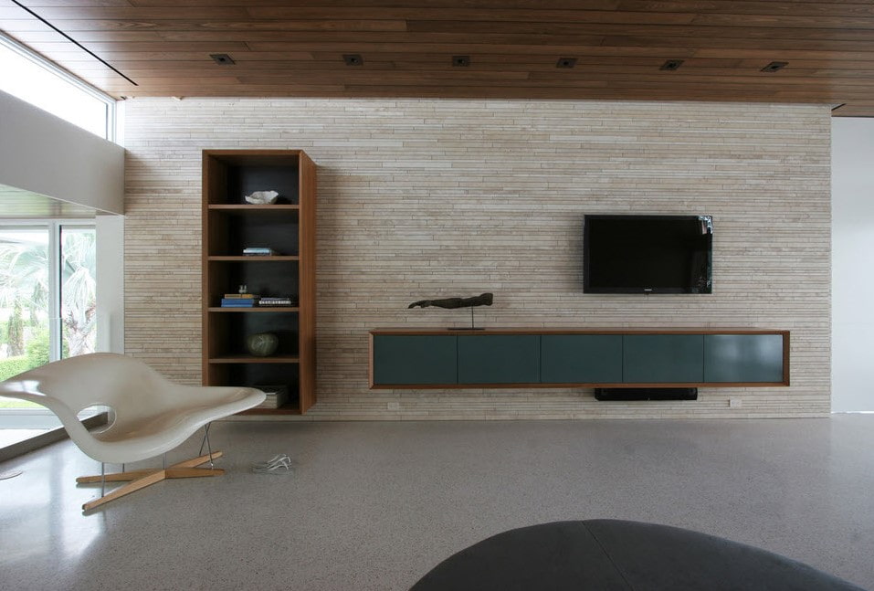 Оформление стены с телевизором в гостиной стиля минимализма